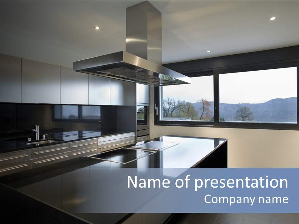 A Modern Kitchen With A Large Window Overlooking The Mountains PowerPoint Template