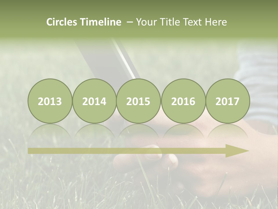 A Person Using A Cell Phone In The Grass PowerPoint Template