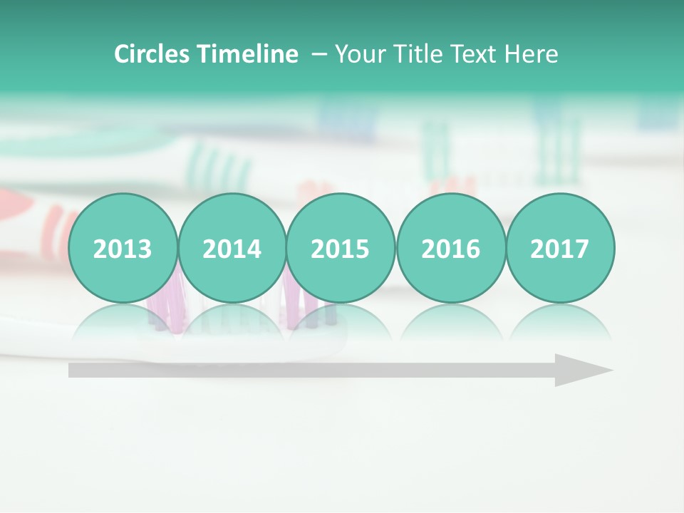 A Group Of Toothbrushes Sitting On Top Of A Table PowerPoint Template