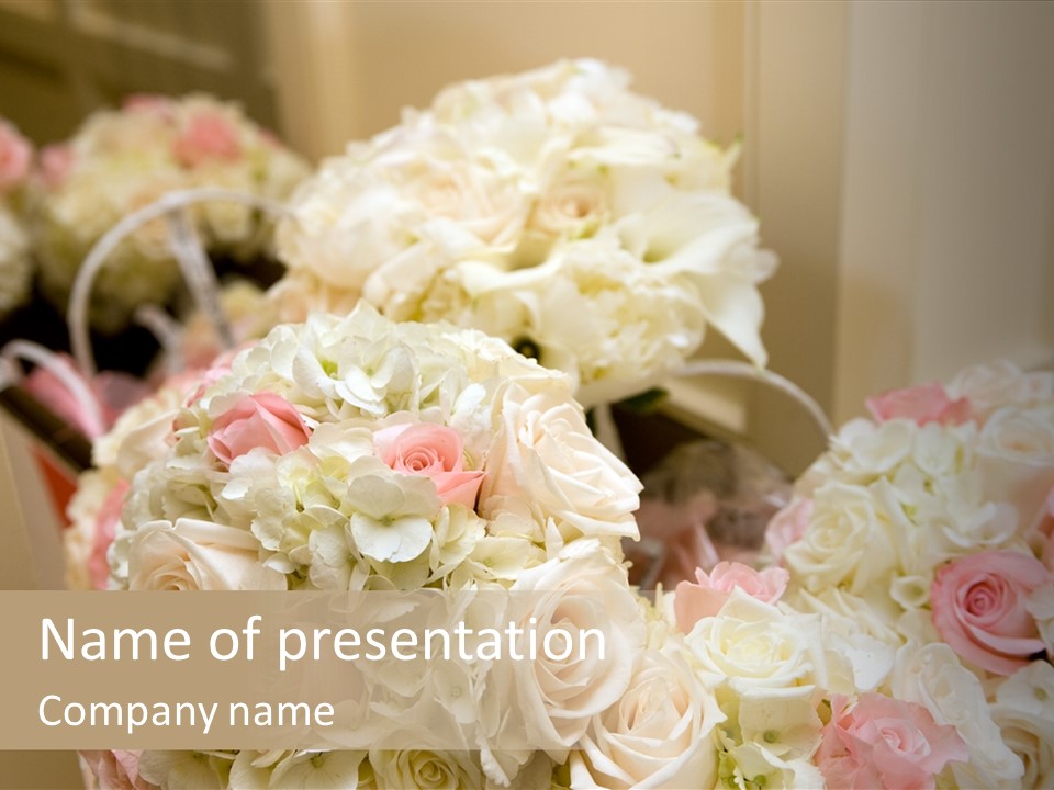 A Bunch Of White And Pink Flowers On A Table PowerPoint Template