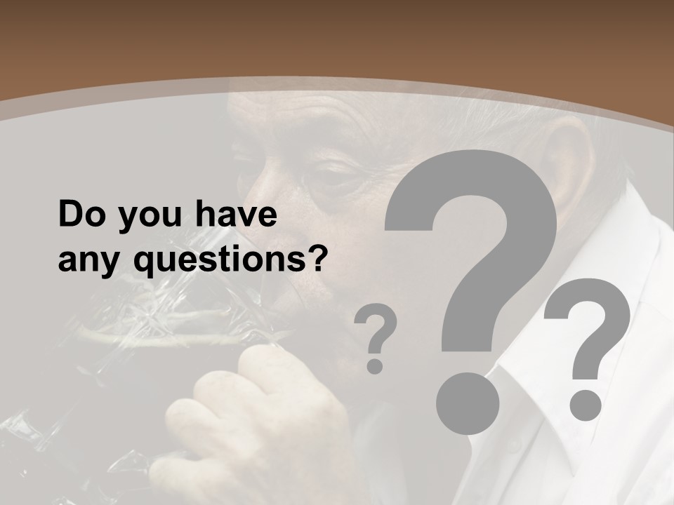 A Man Drinking A Glass Of Wine From A Wine Glass PowerPoint Template