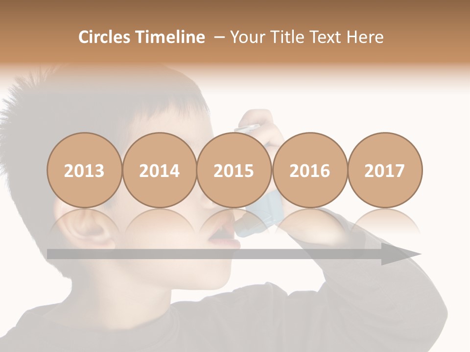 A Young Boy Holding A Cell Phone To His Ear PowerPoint Template