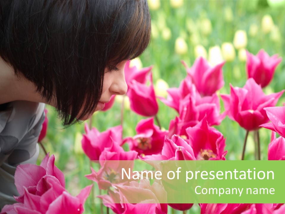 A Young Girl Smelling A Bunch Of Pink Flowers PowerPoint Template
