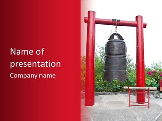 A Large Bell Sitting In The Middle Of A Park PowerPoint Template