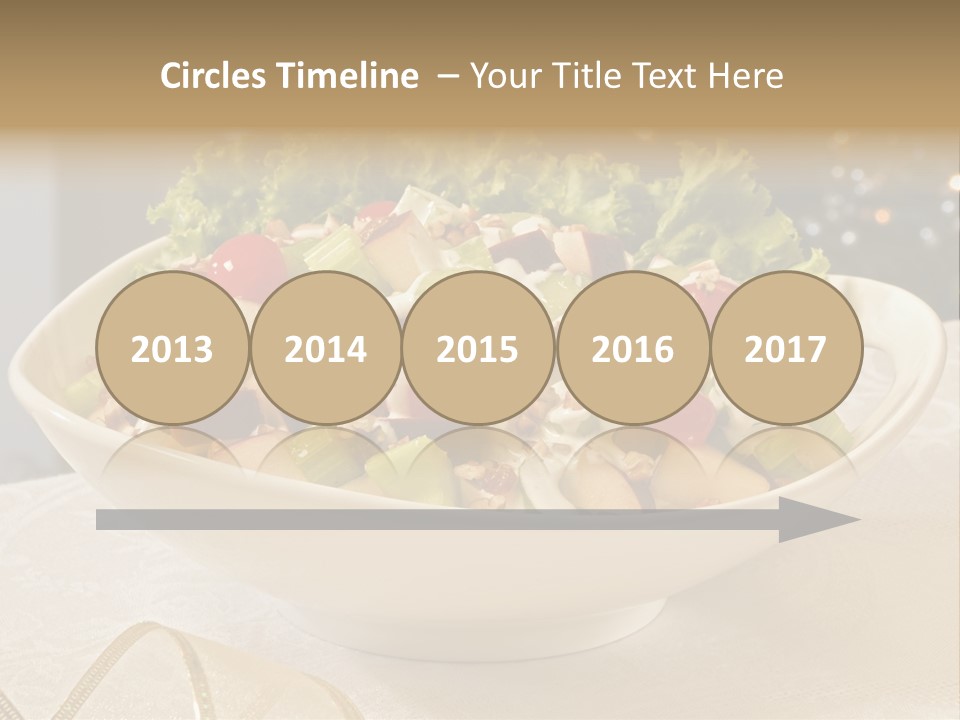 A White Bowl Filled With A Salad On Top Of A Table PowerPoint Template