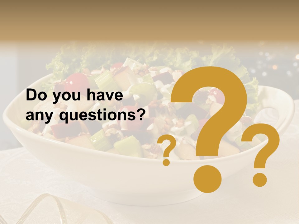 A White Bowl Filled With A Salad On Top Of A Table PowerPoint Template