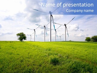 A Green Field With Wind Turbines In The Background PowerPoint Template