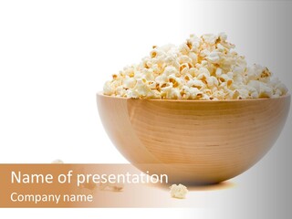 A Wooden Bowl Filled With Popcorn On Top Of A Table PowerPoint Template