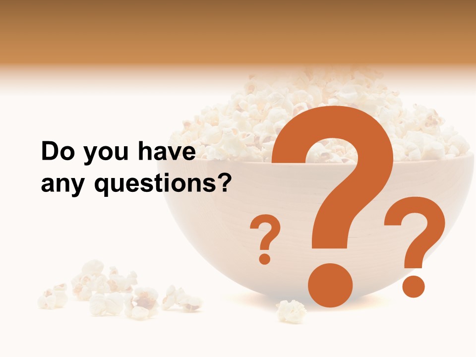 A Wooden Bowl Filled With Popcorn On Top Of A Table PowerPoint Template