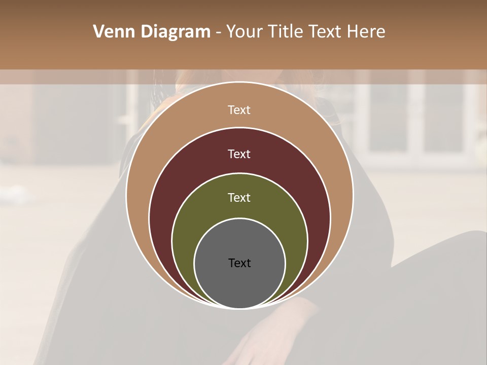 A Woman In A Graduation Cap And Gown Sitting On A Ledge PowerPoint Template