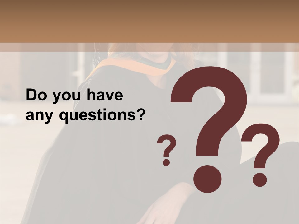 A Woman In A Graduation Cap And Gown Sitting On A Ledge PowerPoint Template