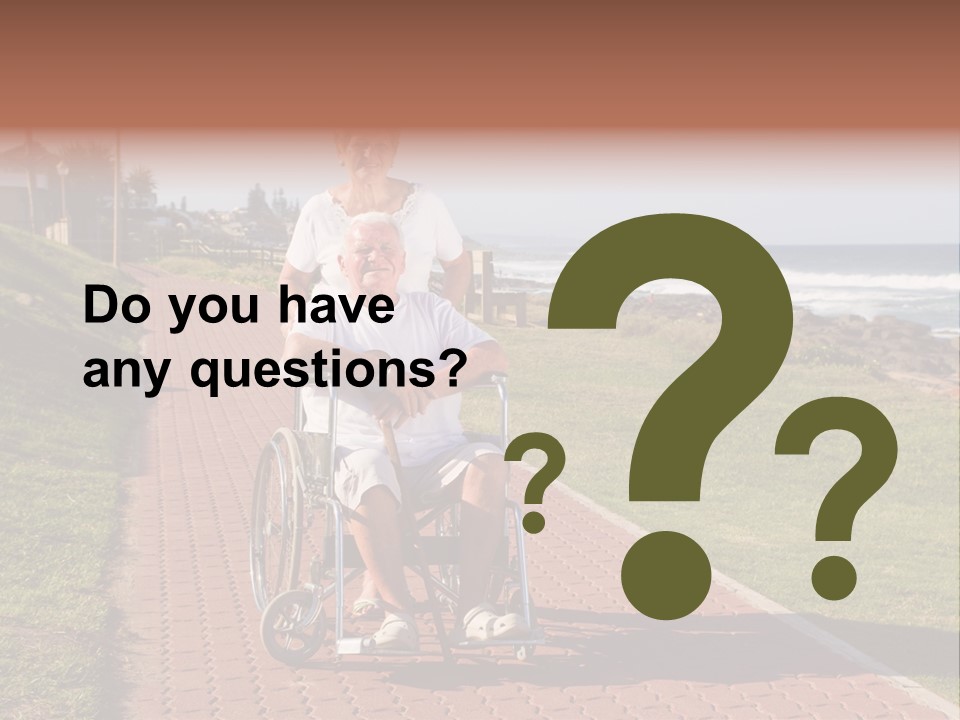A Man In A Wheel Chair Being Pushed By A Woman PowerPoint Template