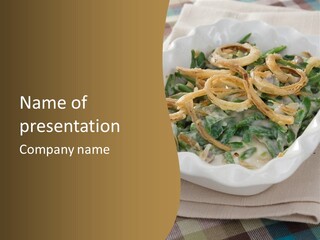 A Plate Of Food With Onion Rings On It PowerPoint Template