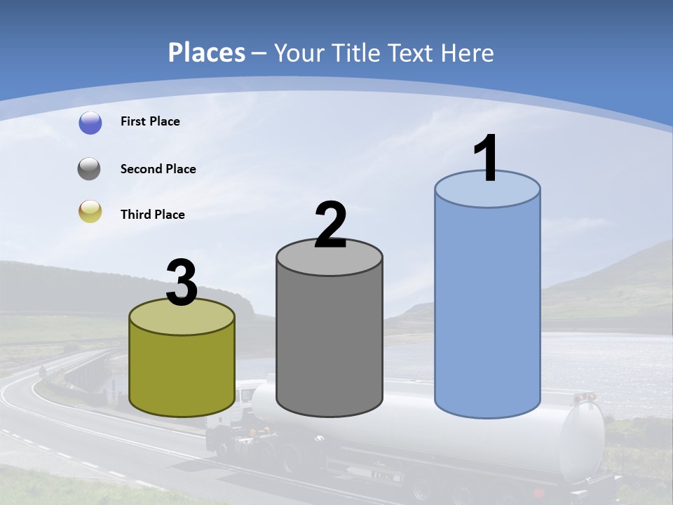 A Tanker Truck Driving Down A Road Next To A Lake PowerPoint Template