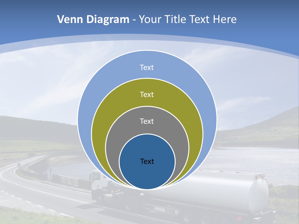 A Tanker Truck Driving Down A Road Next To A Lake PowerPoint Template