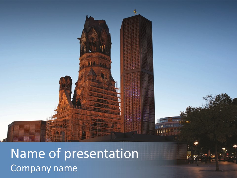 A Large Building With A Clock Tower In The Middle Of It PowerPoint Template