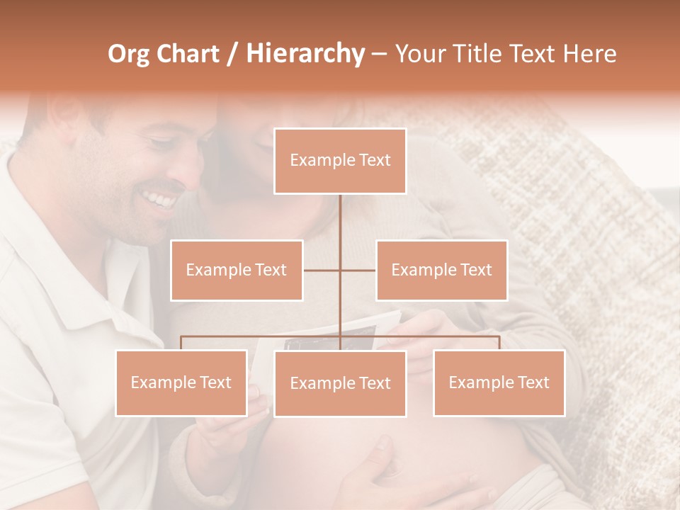 A Man And Woman Sitting On A Couch Looking At A Picture PowerPoint Template