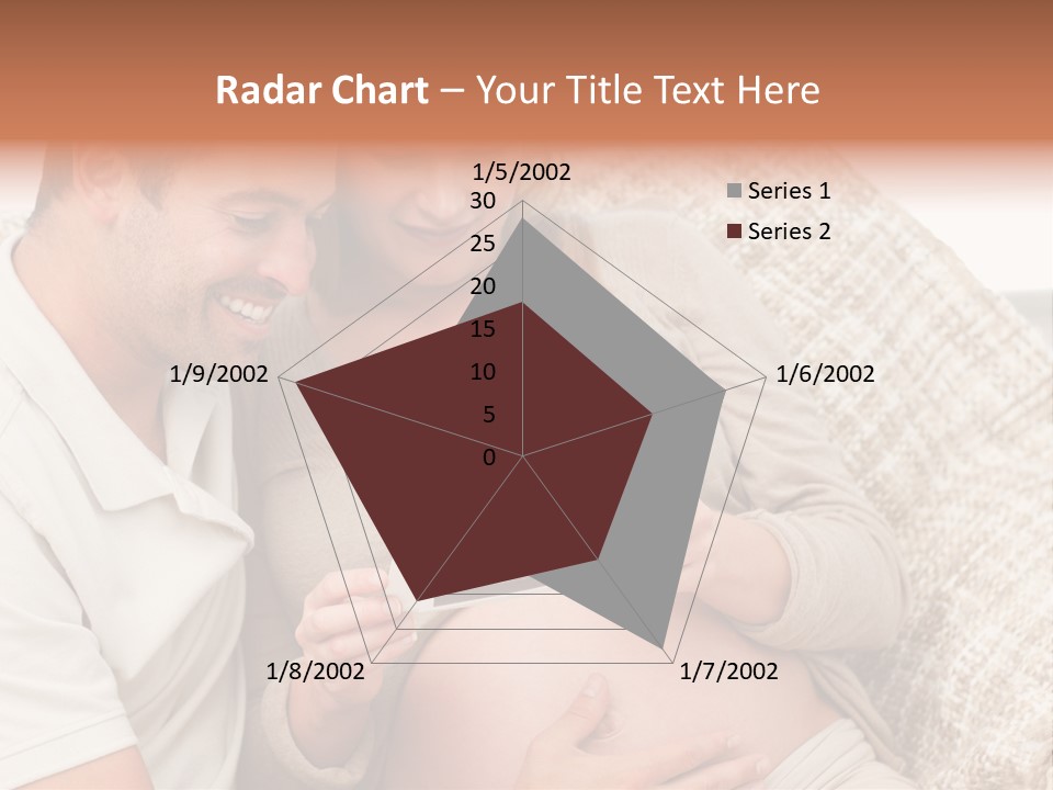 A Man And Woman Sitting On A Couch Looking At A Picture PowerPoint Template