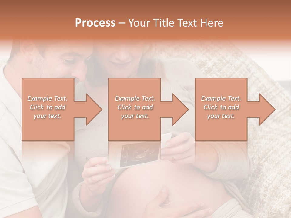 A Man And Woman Sitting On A Couch Looking At A Picture PowerPoint Template