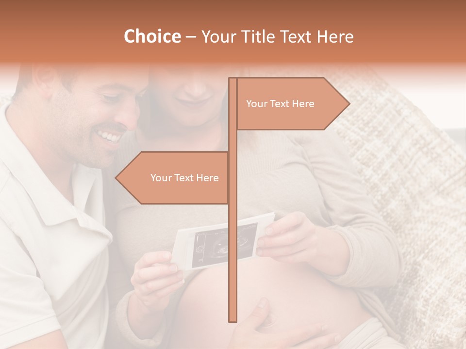 A Man And Woman Sitting On A Couch Looking At A Picture PowerPoint Template