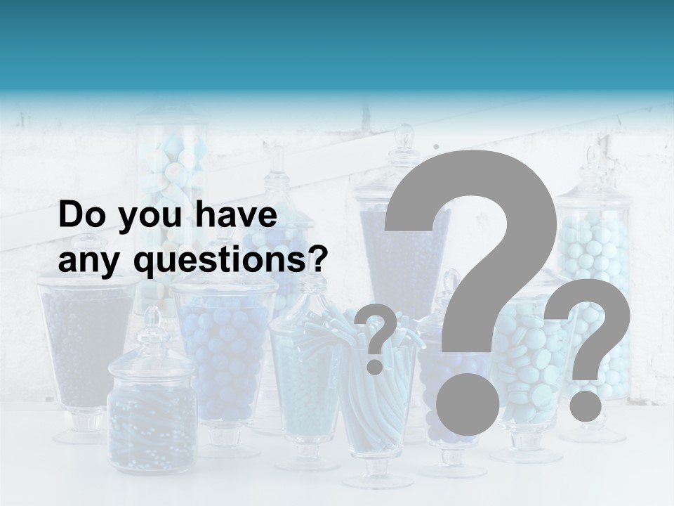 A Table Topped With Lots Of Blue And White Candy PowerPoint Template