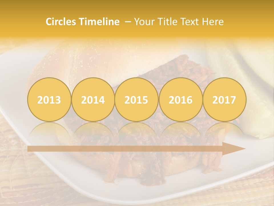 A Pulled Pork Sandwich With Pickles On A Plate PowerPoint Template