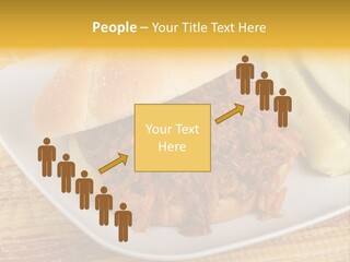 A Pulled Pork Sandwich With Pickles On A Plate PowerPoint Template