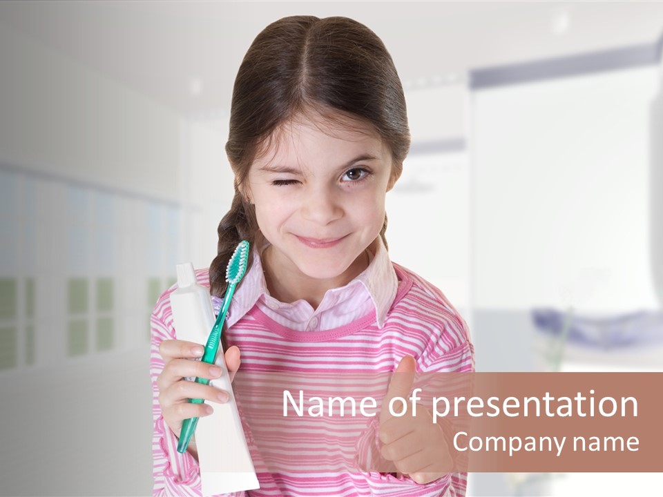A Young Girl Holding A Toothbrush And Giving A Thumbs Up PowerPoint Template