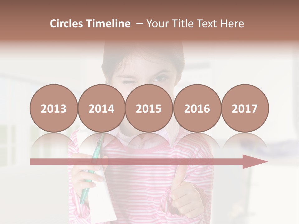 A Young Girl Holding A Toothbrush And Giving A Thumbs Up PowerPoint Template