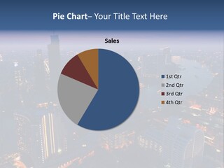 An Aerial View Of A City At Night PowerPoint Template