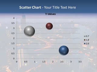 An Aerial View Of A City At Night PowerPoint Template