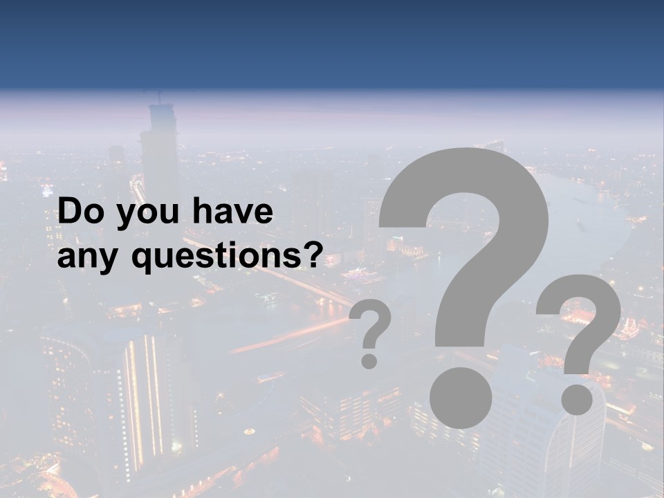 An Aerial View Of A City At Night PowerPoint Template