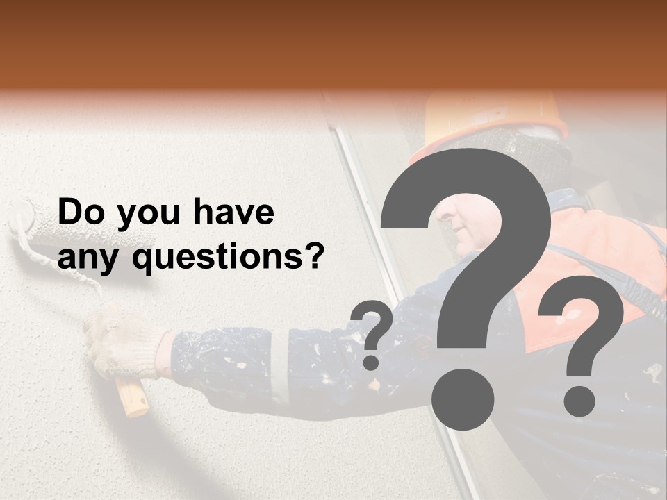 A Man Is Painting A Wall With A Paint Roller PowerPoint Template