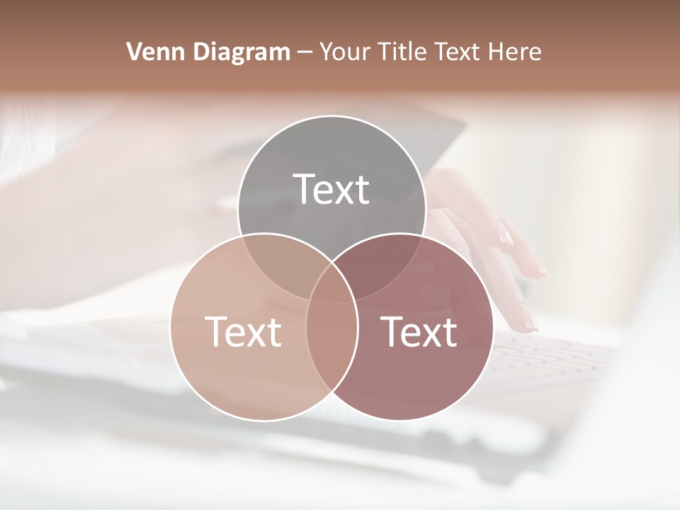 A Woman Holding A Credit Card While Typing On A Laptop PowerPoint Template