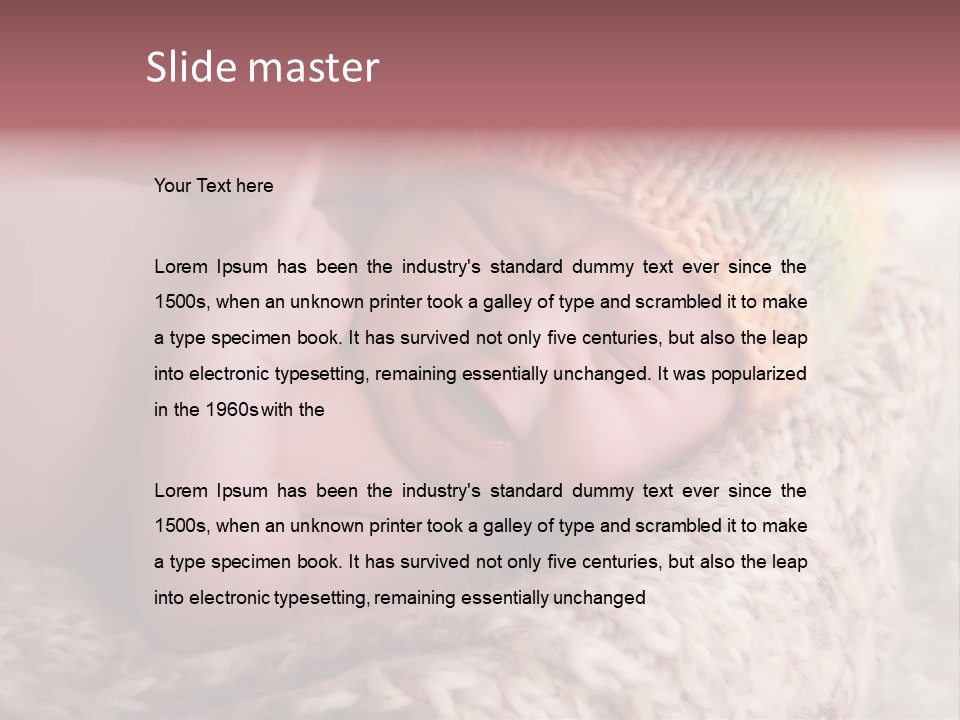 A Baby Wearing A Knitted Hat Laying On Top Of A Blanket PowerPoint Template