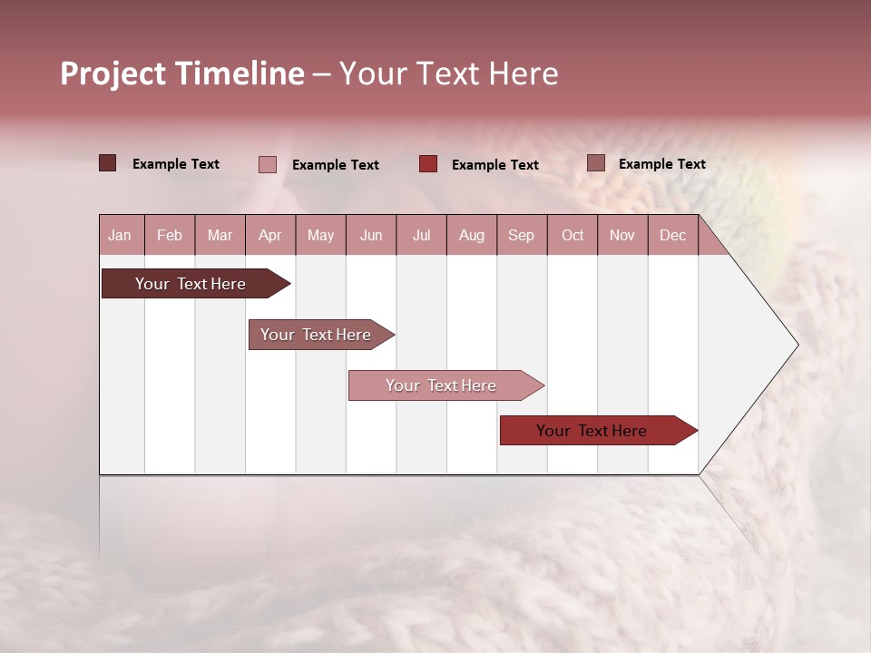 A Baby Wearing A Knitted Hat Laying On Top Of A Blanket PowerPoint Template