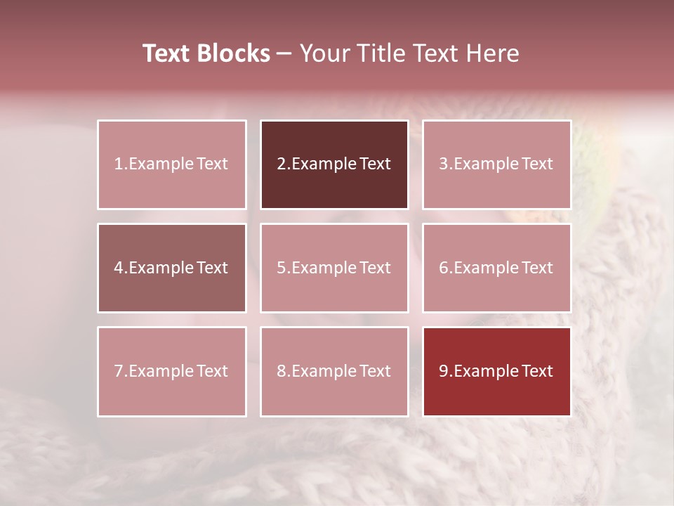 A Baby Wearing A Knitted Hat Laying On Top Of A Blanket PowerPoint Template