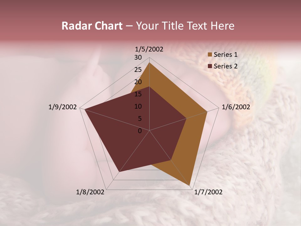 A Baby Wearing A Knitted Hat Laying On Top Of A Blanket PowerPoint Template