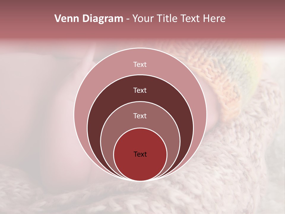 A Baby Wearing A Knitted Hat Laying On Top Of A Blanket PowerPoint Template