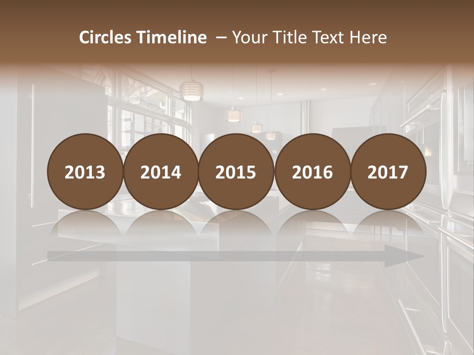 A Modern Kitchen With Stainless Steel Appliances And A Large Window PowerPoint Template