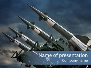 A Group Of Military Missiles With A Cloudy Sky In The Background PowerPoint Template
