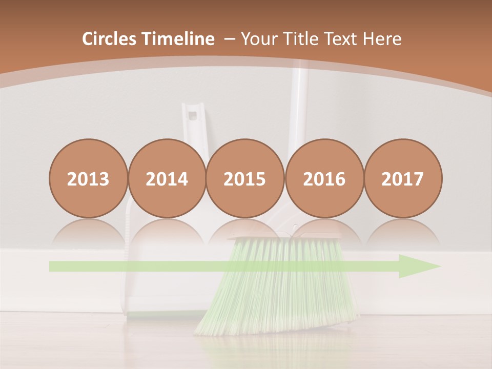 A Broom And A Dustpan On A Hard Wood Floor PowerPoint Template