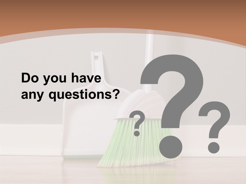 A Broom And A Dustpan On A Hard Wood Floor PowerPoint Template