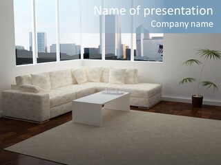 A Living Room With A Couch And A Coffee Table PowerPoint Template