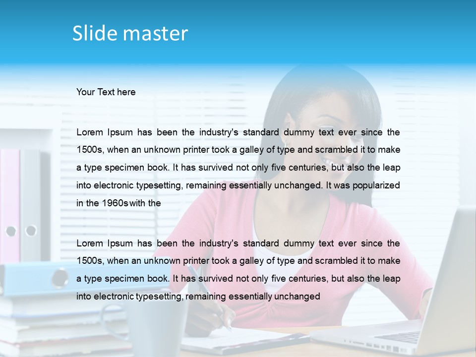 A Woman Sitting At A Desk With A Laptop PowerPoint Template