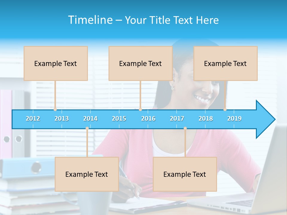 A Woman Sitting At A Desk With A Laptop PowerPoint Template