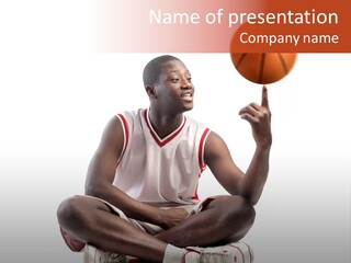 A Man Sitting On A Stool Holding A Basketball PowerPoint Template