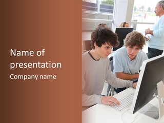 Two Men Working On A Computer In An Office PowerPoint Template