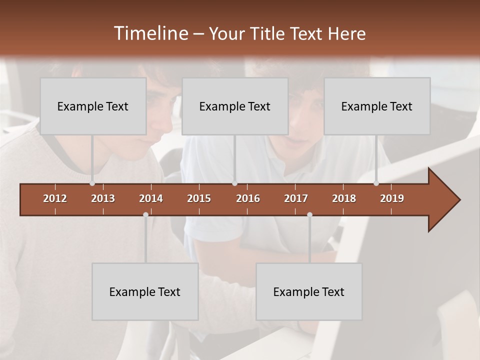 Two Men Working On A Computer In An Office PowerPoint Template