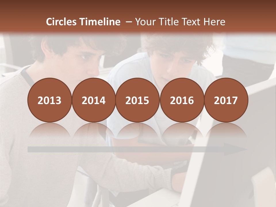 Two Men Working On A Computer In An Office PowerPoint Template